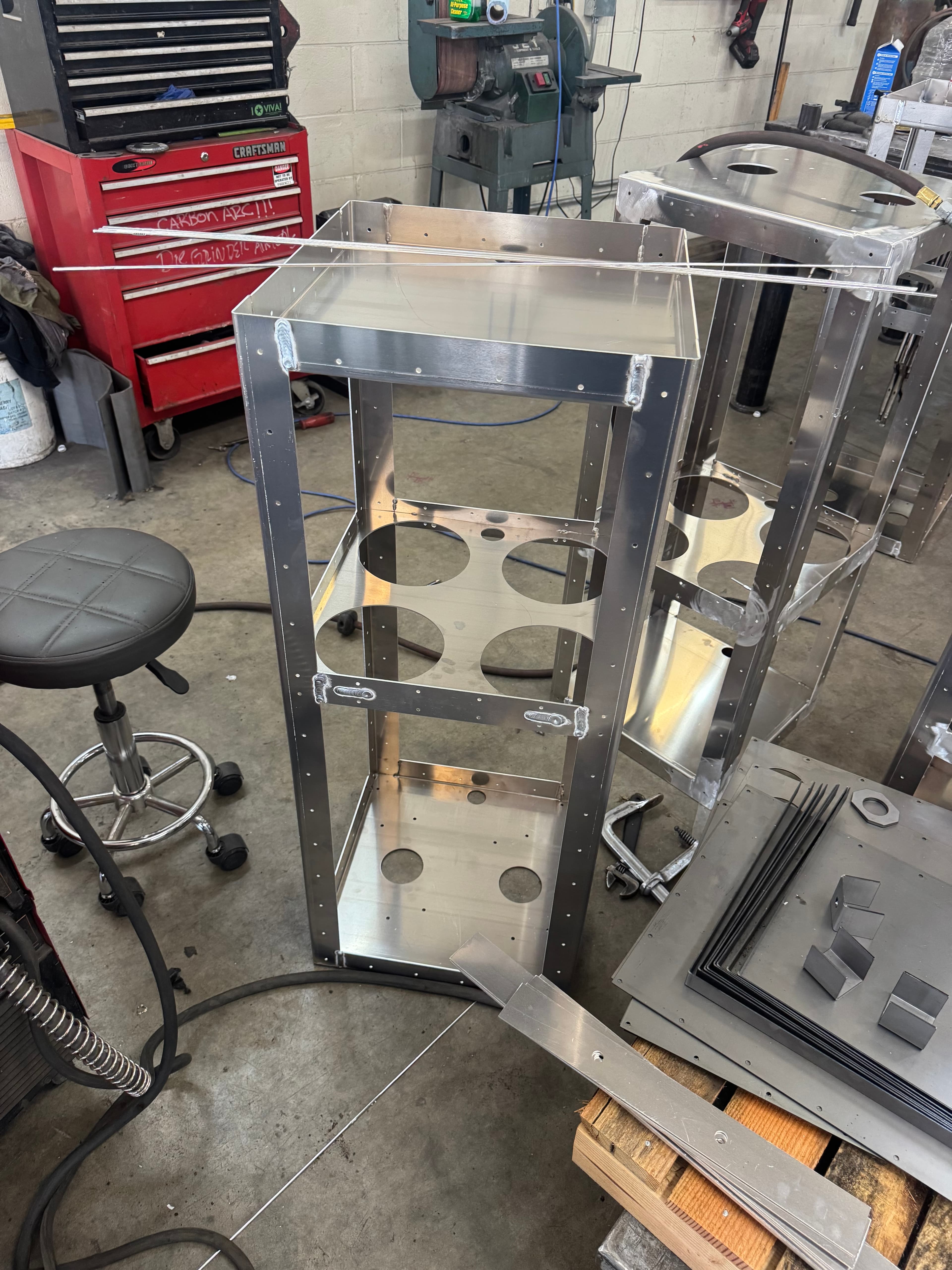 SquareVac chassis with motor mounting cutouts in fabrication