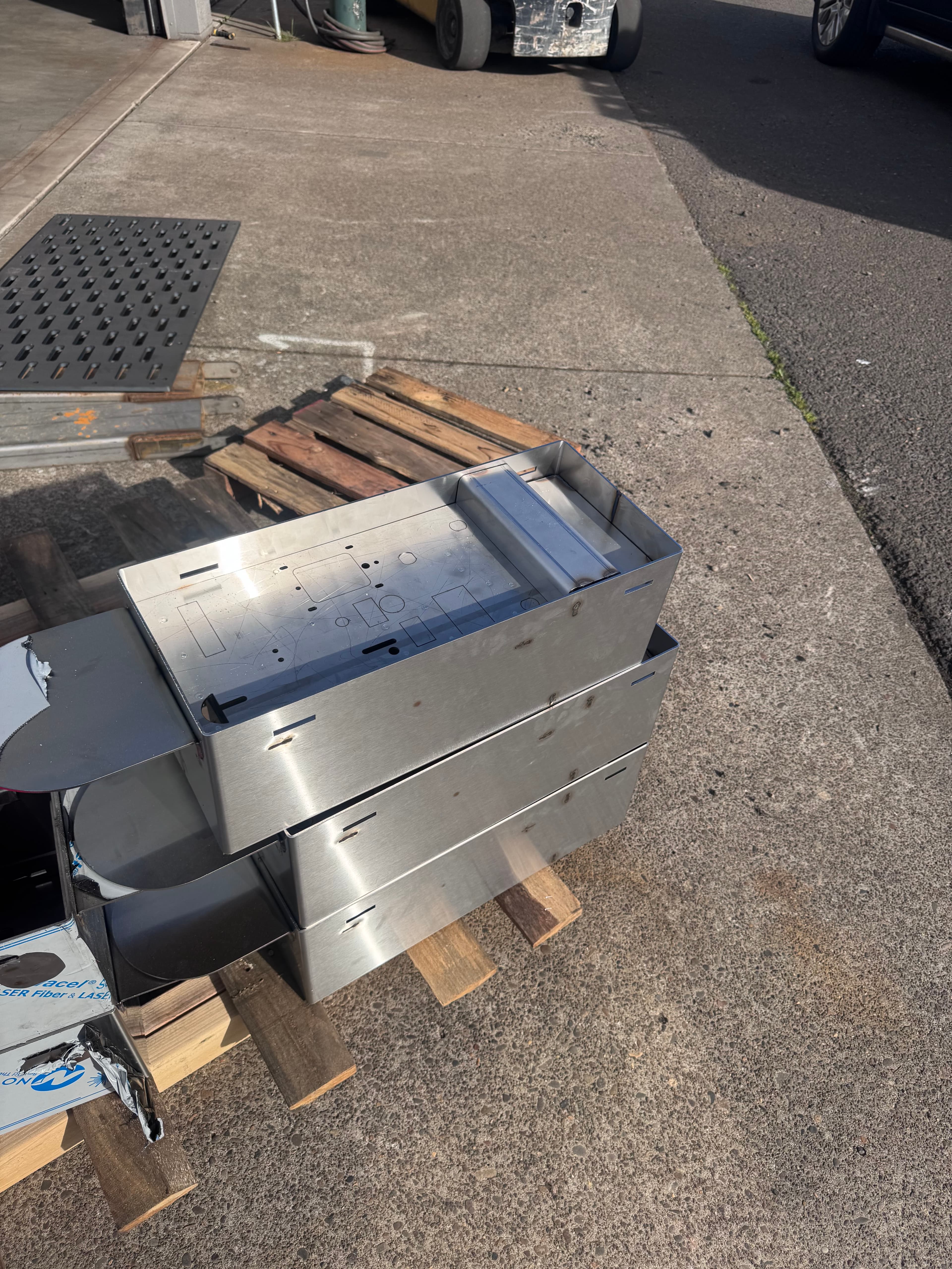 Stainless steel SquareVac canister on shipping pallet